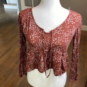 Long sleeve crop top. Size medium but runs small.